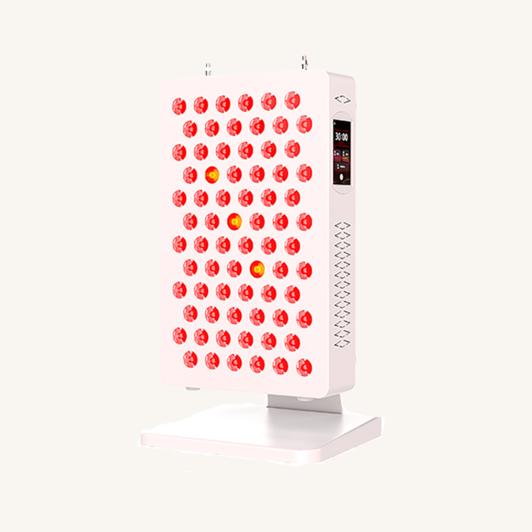 Side view of the Juveo P100 red light therapy panel with multiple illuminated LED bulbs on a stand